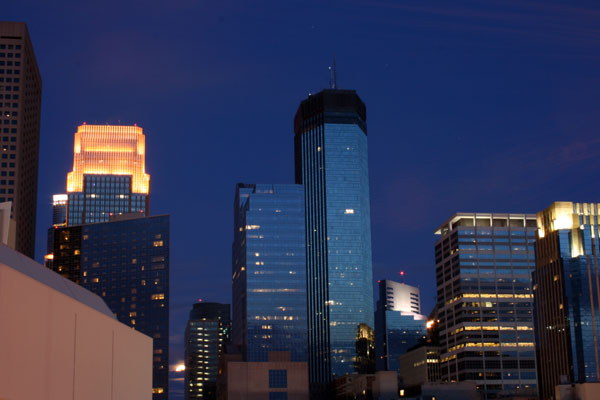 Moon through the Minneapolis skyline.