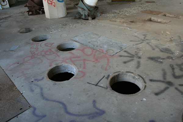 Open holes down into the grain silos. Bunge Grain Elevator, Minneapolis, MN. Open holes down into the grain silos. Bunge Grain Elevator, Minneapolis, MN.