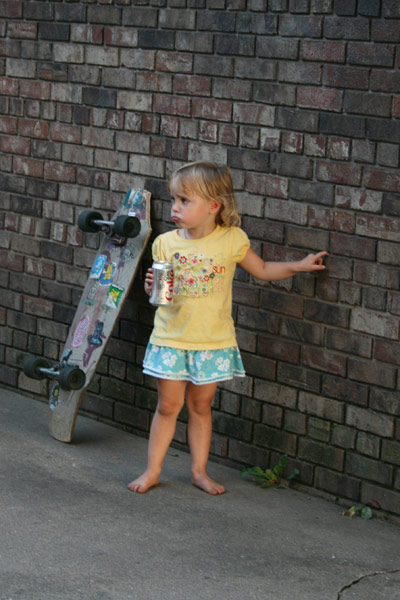 Little girl and a skateboard